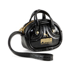 PUMA 1976 GRIP BAG KEYCHAIN ​​- PUMA BLACK-ARCHIVE GOLD